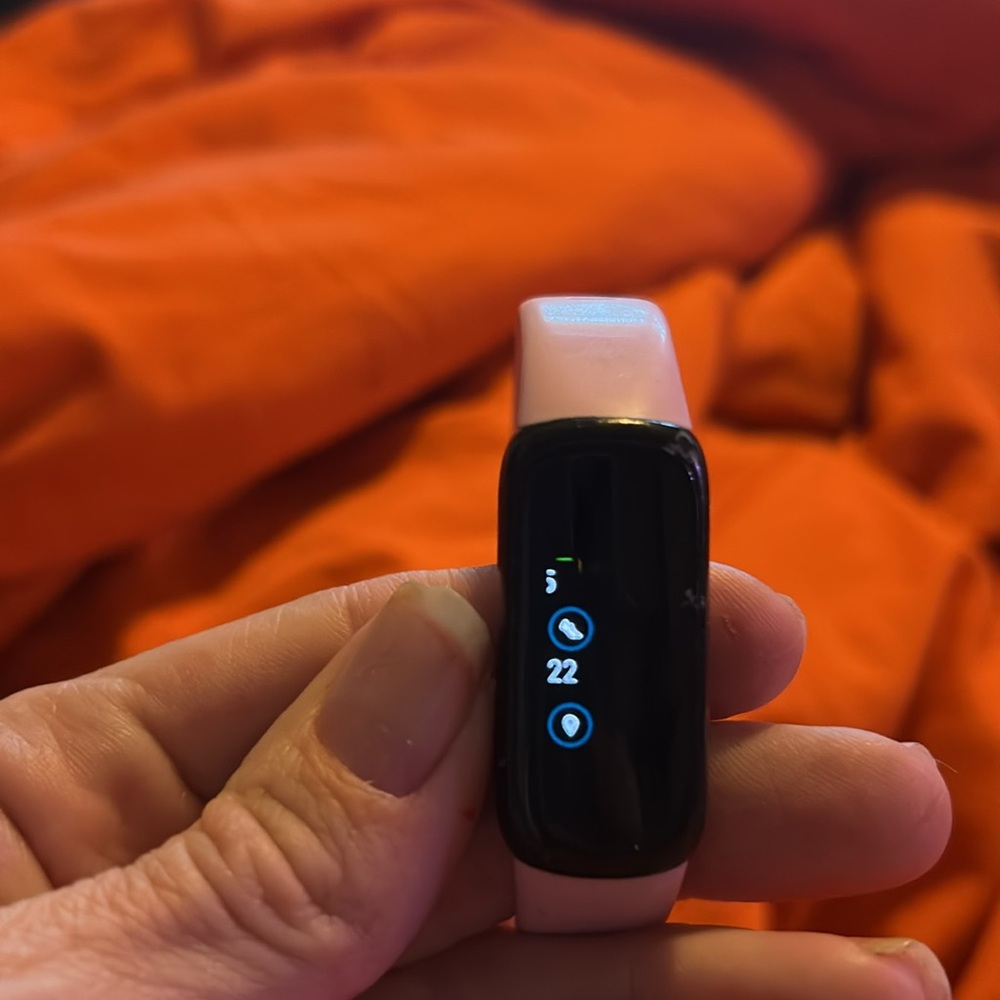 Pink and black Fitbit - Picture 2 of 2